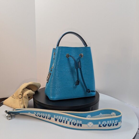 Louis Vuitton Handbags - Louis Vuitton Noé BB Bag in Epi Leather with LV Strap and Charm